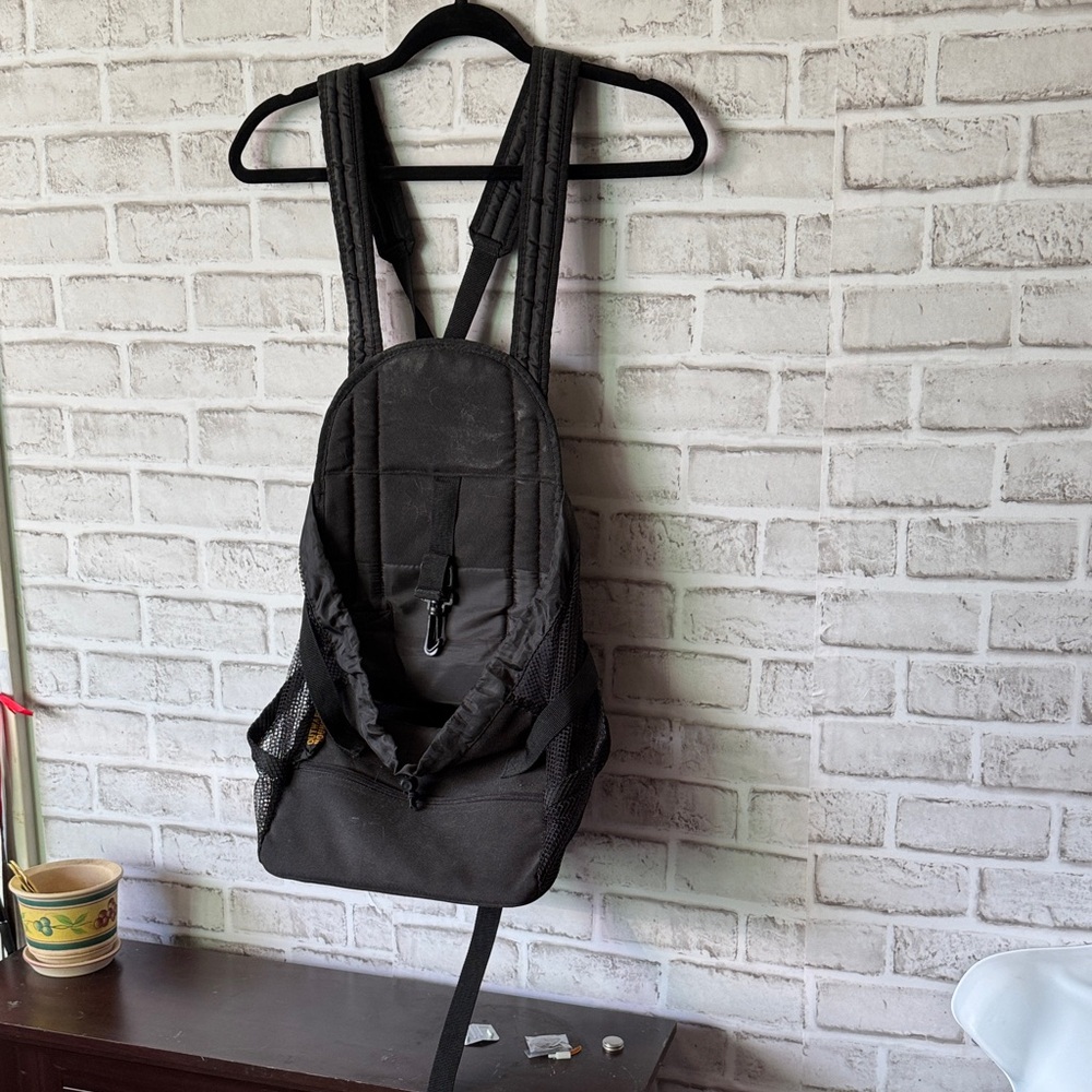 Puppy Carrier.  Black Backpack for pup or puppy use for front to keep an I on